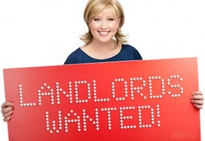 woman with sign landlords wanted