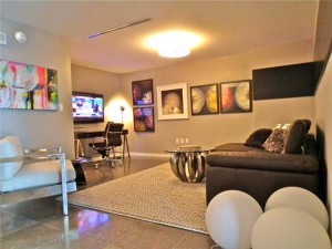 condo living room with big balls decor