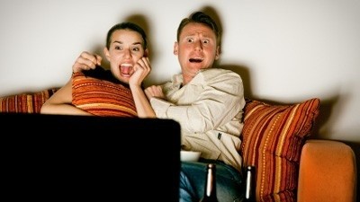 couple scared with movie